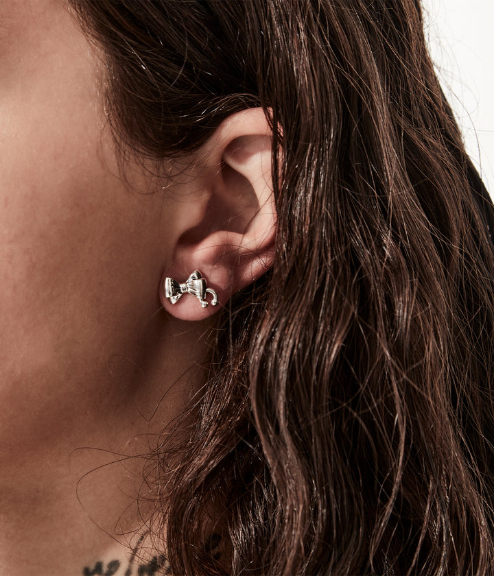Stolen Silver Pierced Bow Earrings