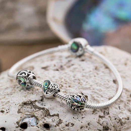 Evolve Aroha Paua Charm