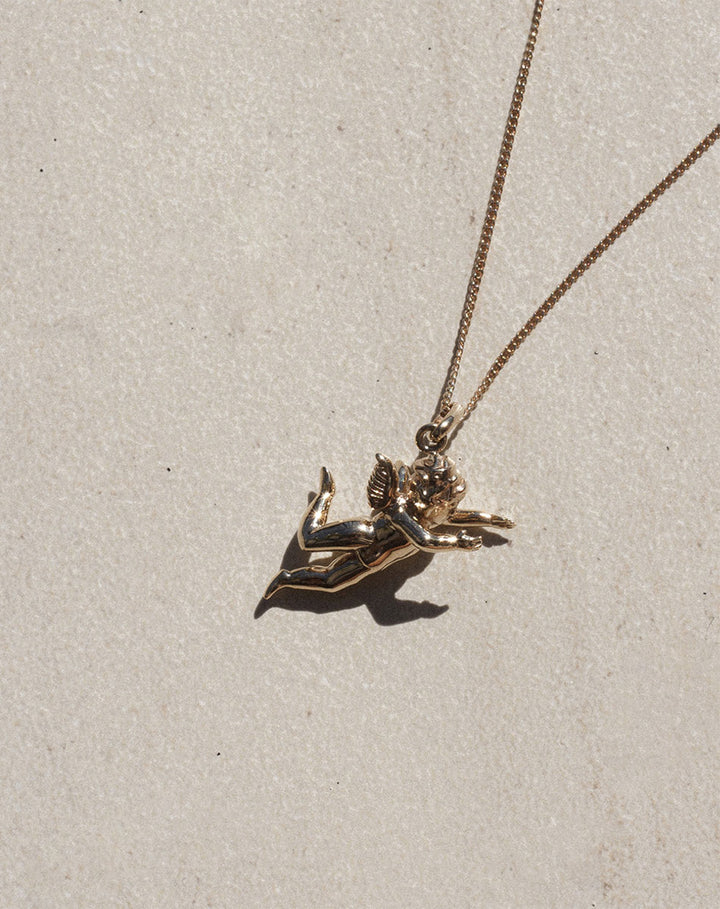 MEADOWLARK 23CT GOLD PLATED CHERUB NECKLACE
