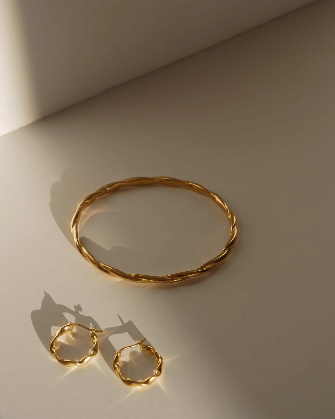 Kirstin Ash Wave Hoops 18ct Gold Plated