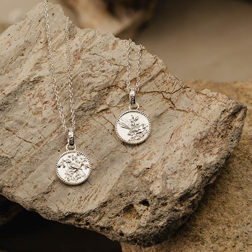 Evolve Tui Coin Silver Necklace