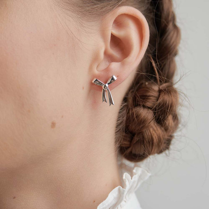 Karen Walker Silver Bow Studs