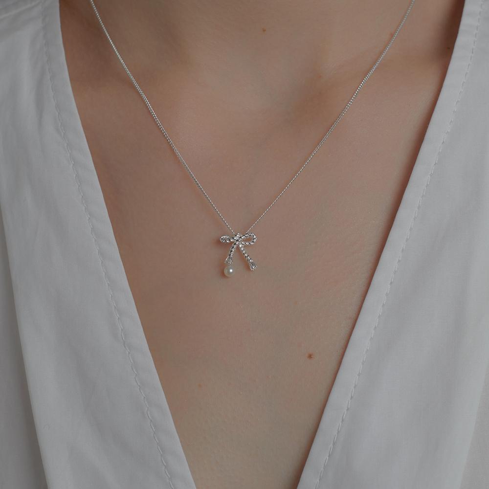 Karen Walker Silver Love Knot Necklace