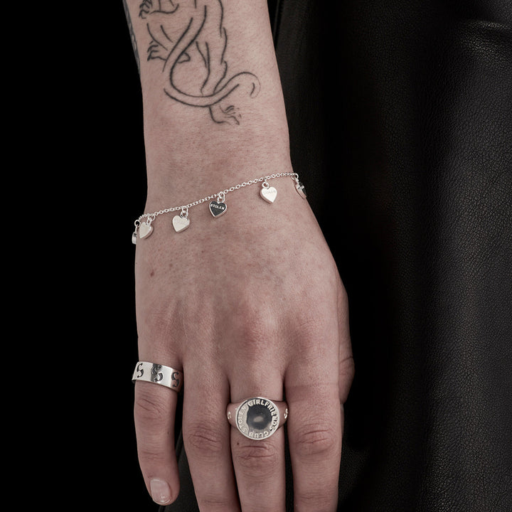 Stolen Silver Heart Bracelet